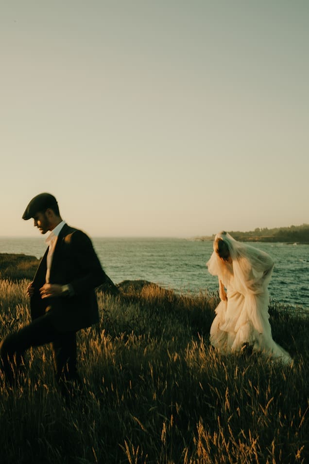 beautiful couple share intimate moments together on the stunning California coast