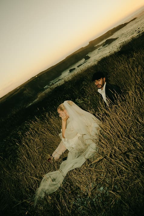 beautiful couple share intimate moments together on the stunning California coast