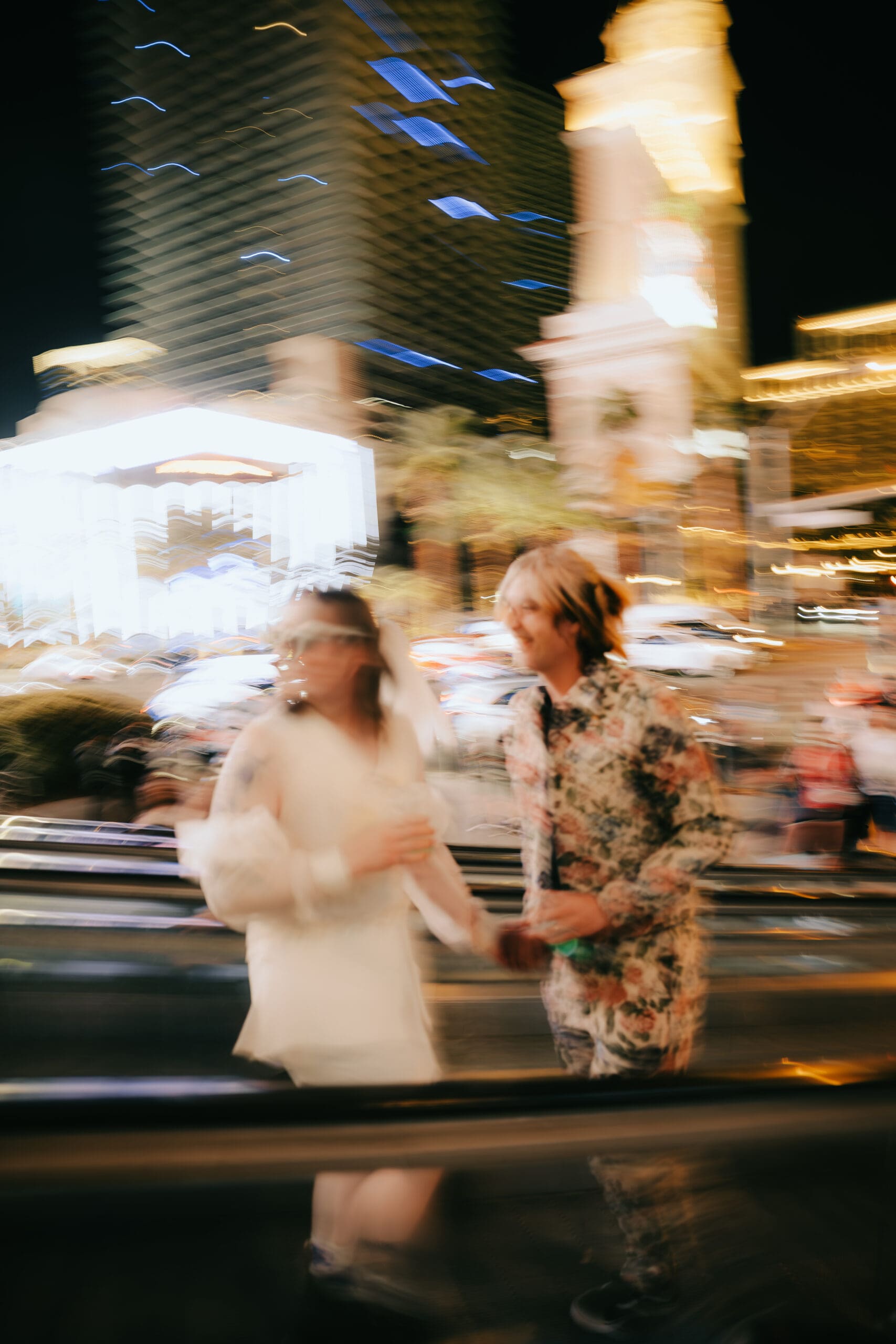 bride and groom laugh as they enjoy Vegas wedding day