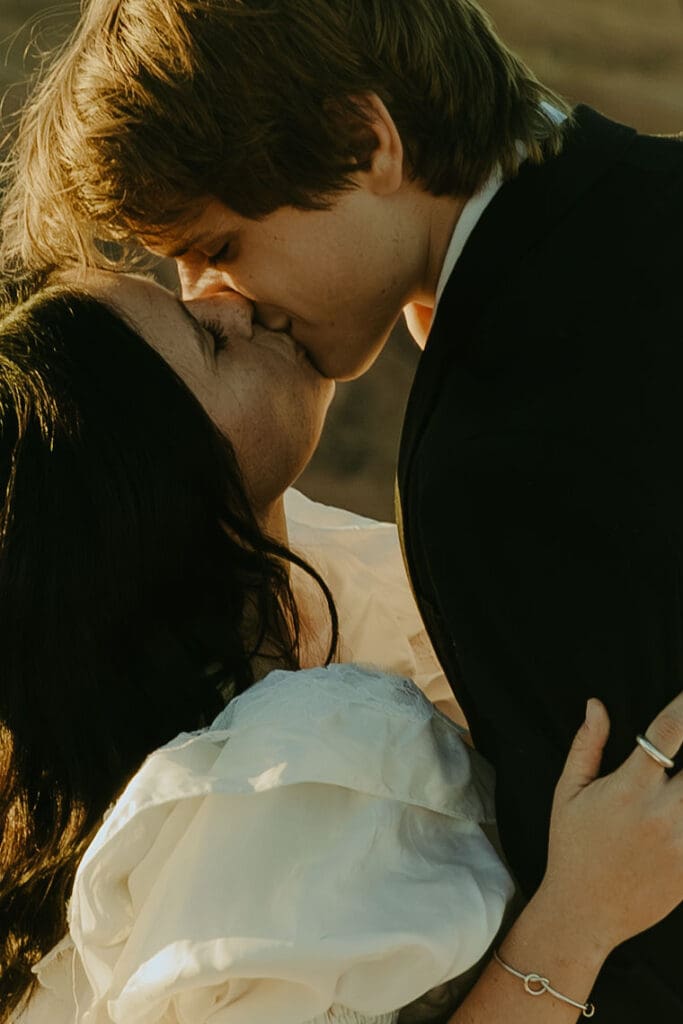 bride and groom share a kiss moment during their elopement