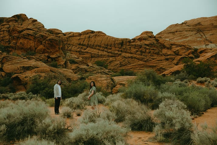 couple look at Kennedi Brooke Photography during their National park elopement