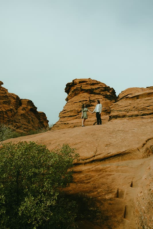 Couple hold hands during their intimate elopement at a national park