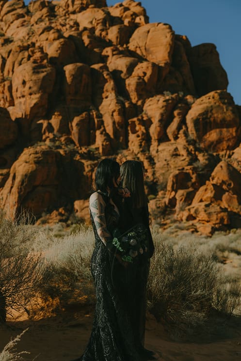 beautiful couple share a kiss during their Southern Utah national park elopement