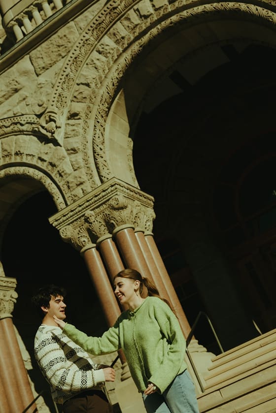couple share a funny moment as they share a laugh during their couples photoshoot