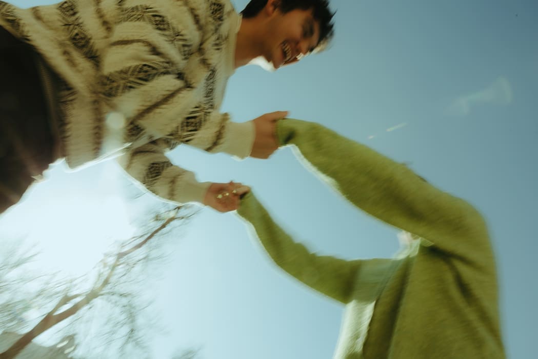 couple dance during their candid couples photos 