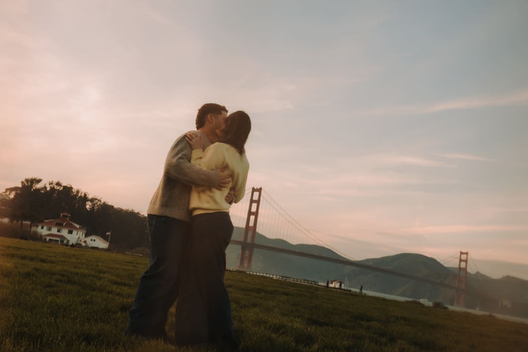 adventure couples session in front of the golden gate bridge