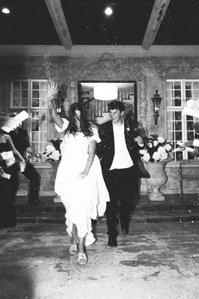 bride and groom exit their beautiful wedding day